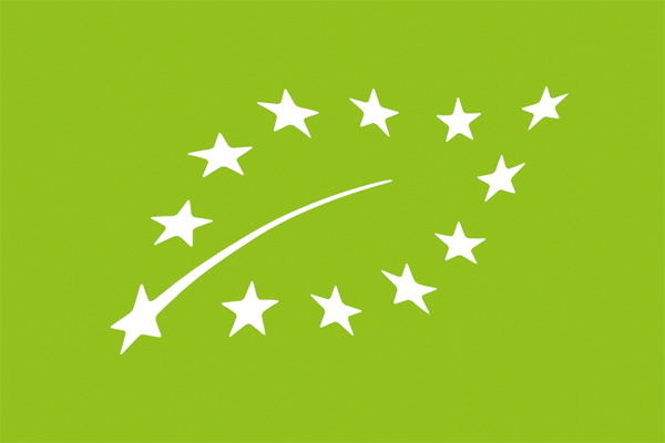 twelve white stars shaped in the form of a leaf on a green background