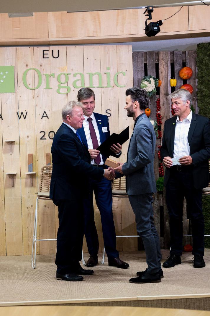 David Pejic receiving his award from EU Commissioner for agriculture, Janusz Wojciechowski
