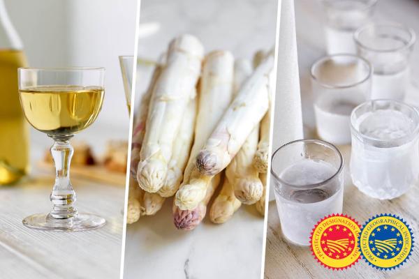 a glass of white wine, white asparagus stalks, spirit drinks and the PDO and PGI logos